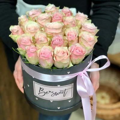 21 pale pink roses in a hat box