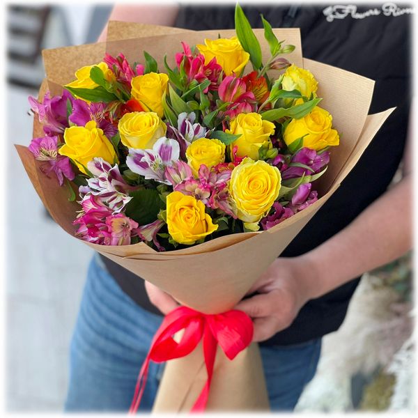 Bright bouquet of roses and alstroemeria