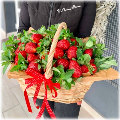 Basket of strawberries with mint