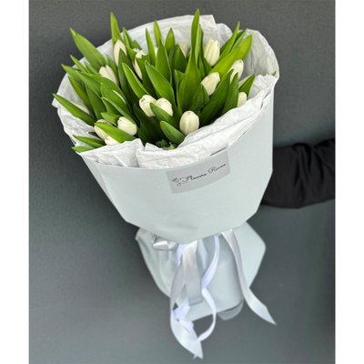 19 white tulips with packaging