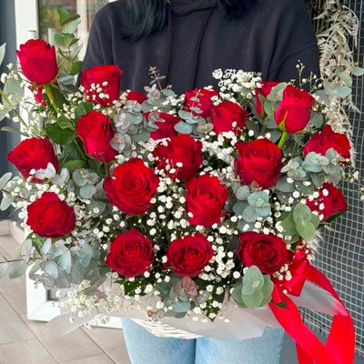 21 red roses in a basket