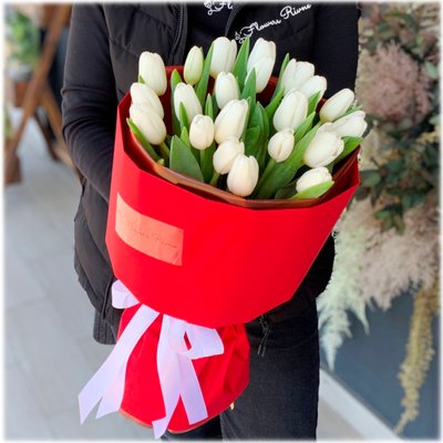 21 white tulips with packaging