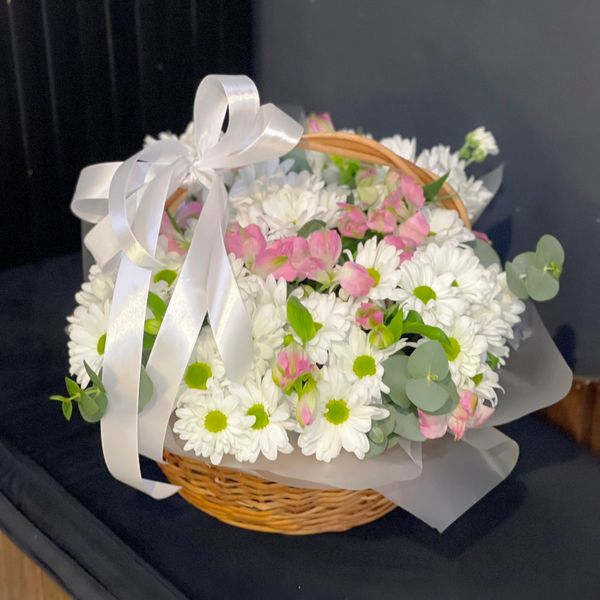 Basket of chamomile chrysanthemums